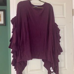 Roaman’s purple poncho